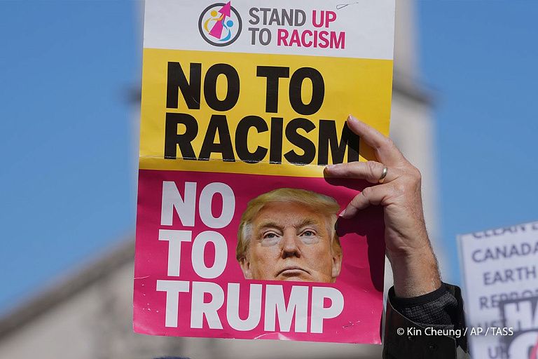 "Руки прочь": первый массовый протест против Трампа охватил США и Европу "Руки прочь": первый массовый протест против Трампа охватил США и Европу